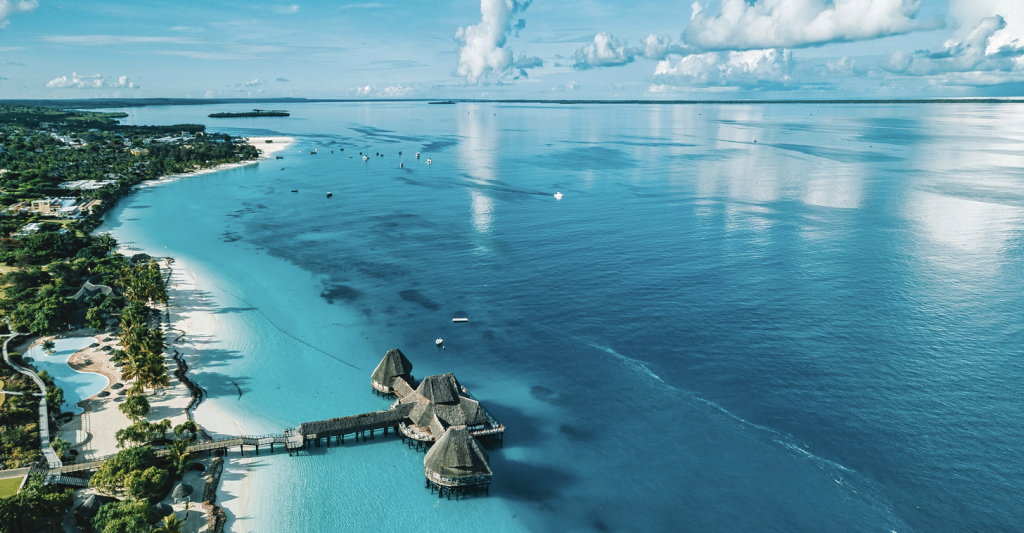 Pristine white sandy beach and turquoise waters of Zanzibar Island, Tanzania