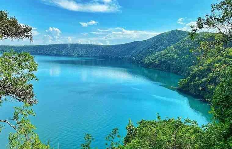Lake Chala crater lake near Mount Kilimanjaro in Tanzania with turquoise waters surrounded by volcanic landscapes