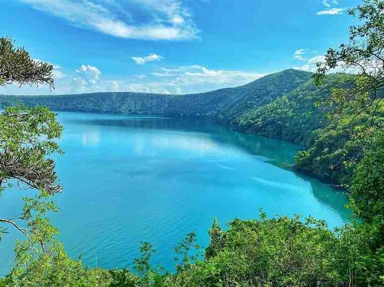 Lake Chala crater lake near Mount Kilimanjaro in Tanzania with turquoise waters surrounded by volcanic landscapes
