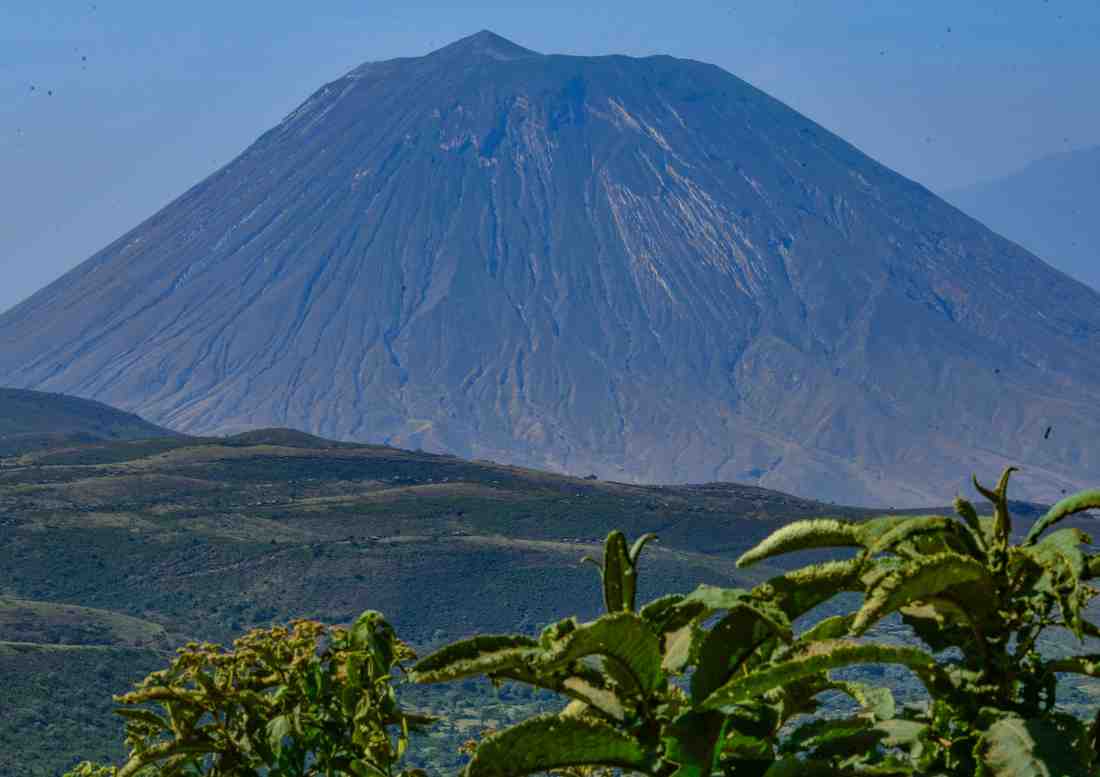 Ol Doinyo Lengai volcano rising above the Great Rift Valley in northern Tanzania near Lake Natron