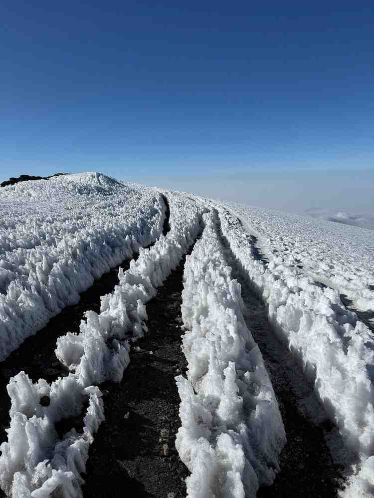 Mountains on the the top, Mount Kilimanjaro.