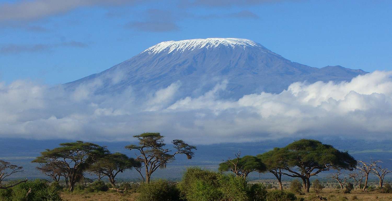 Panoramic mountain landscape of the Northern Circuit Route on Mount Kilimanjaro with vast open wilderness and volcanic terrain in Tanzania.
