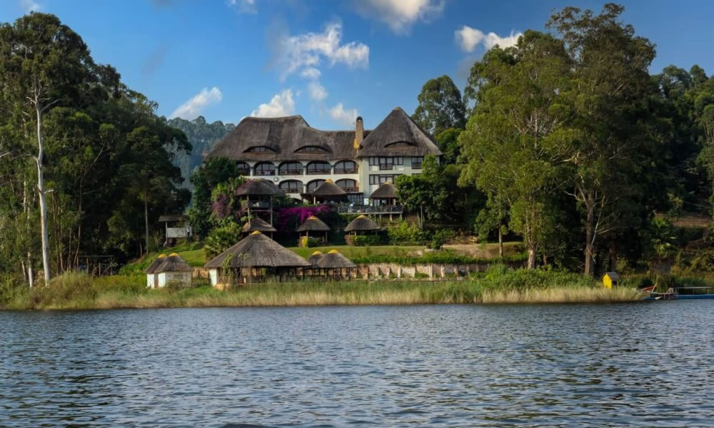Rwanda gorilla trekking and Lake Kivu safari featuring Volcanoes National Park mountain gorilla encounters, scenic lakeside landscapes, and cultural experiences