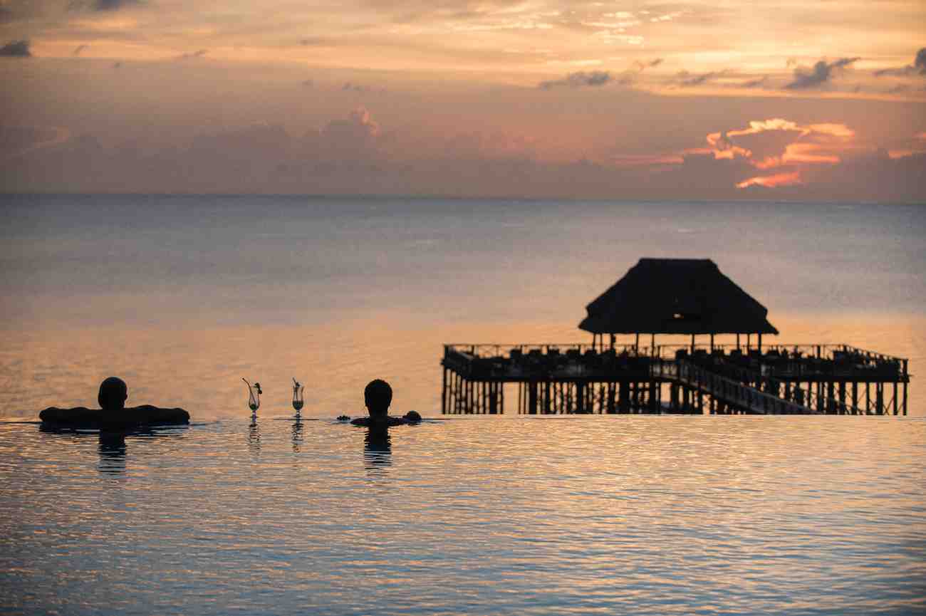 Hidden beach on Zanzibar or Pemba Island with turquoise Indian Ocean waters during a cultural coastal escape in Tanzania