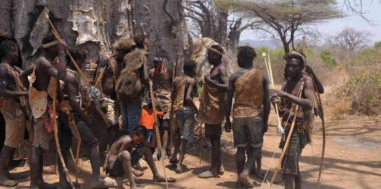 Hadzabe community members gathered during a cultural visit